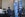 A Transportation Security Administration (TSA) PreCheck sign is displayed as travelers carry baggage through a security checkpoint at Los Angeles International Airport (LAX)